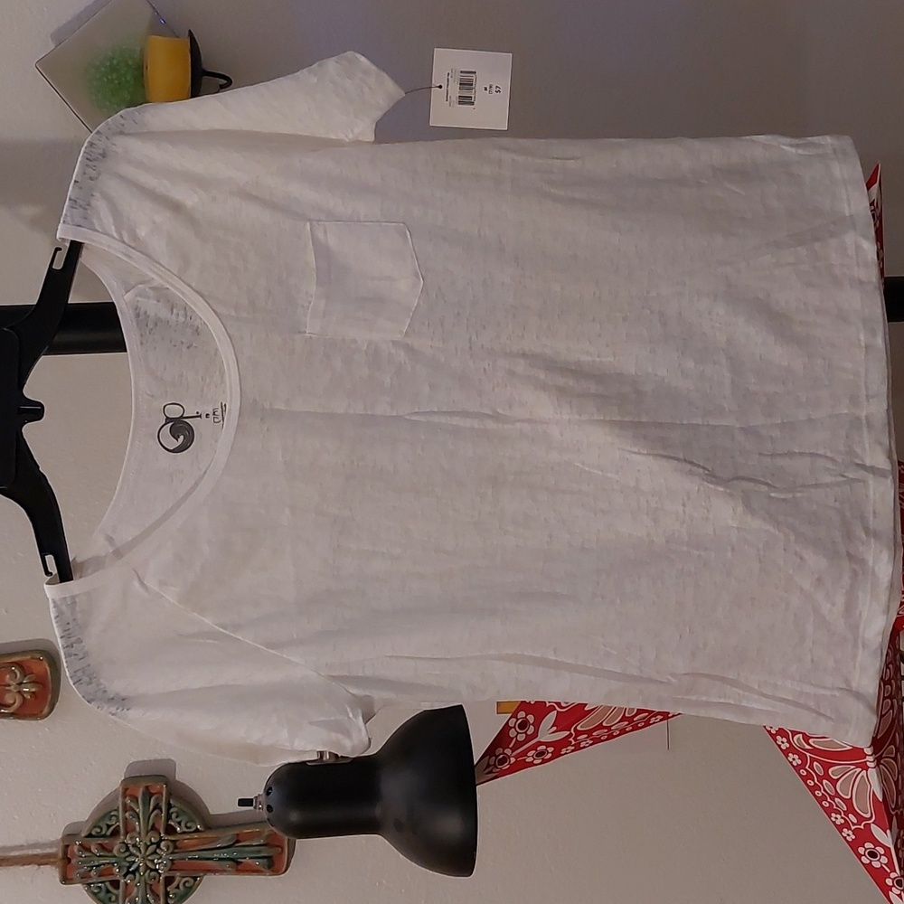 White loose flowy burnout short sleeve tee with tiny pocket perfect for layering